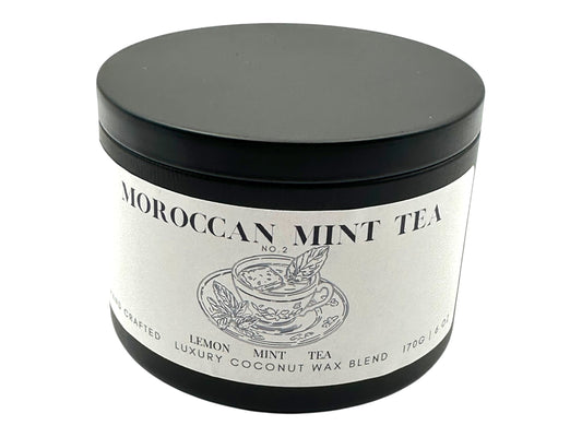 A Black Candle tin labeled Moroccan Mint Tea on a white background.