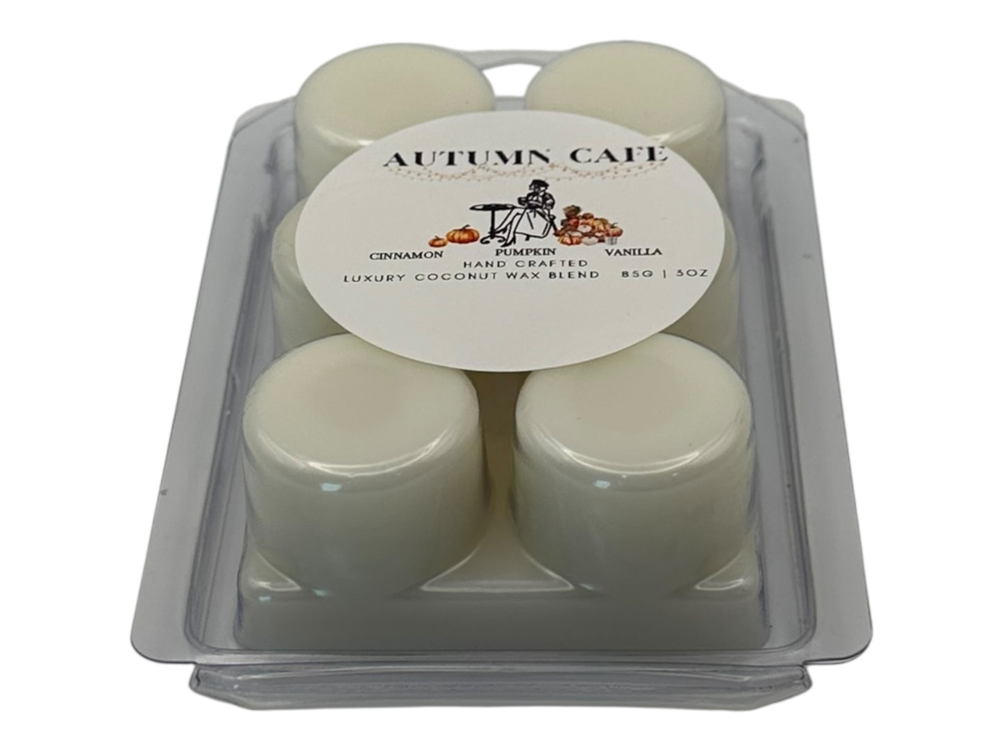 Pack of six white wax melts  in a clear plastic container with 'Autumn Cafe' label on a white background