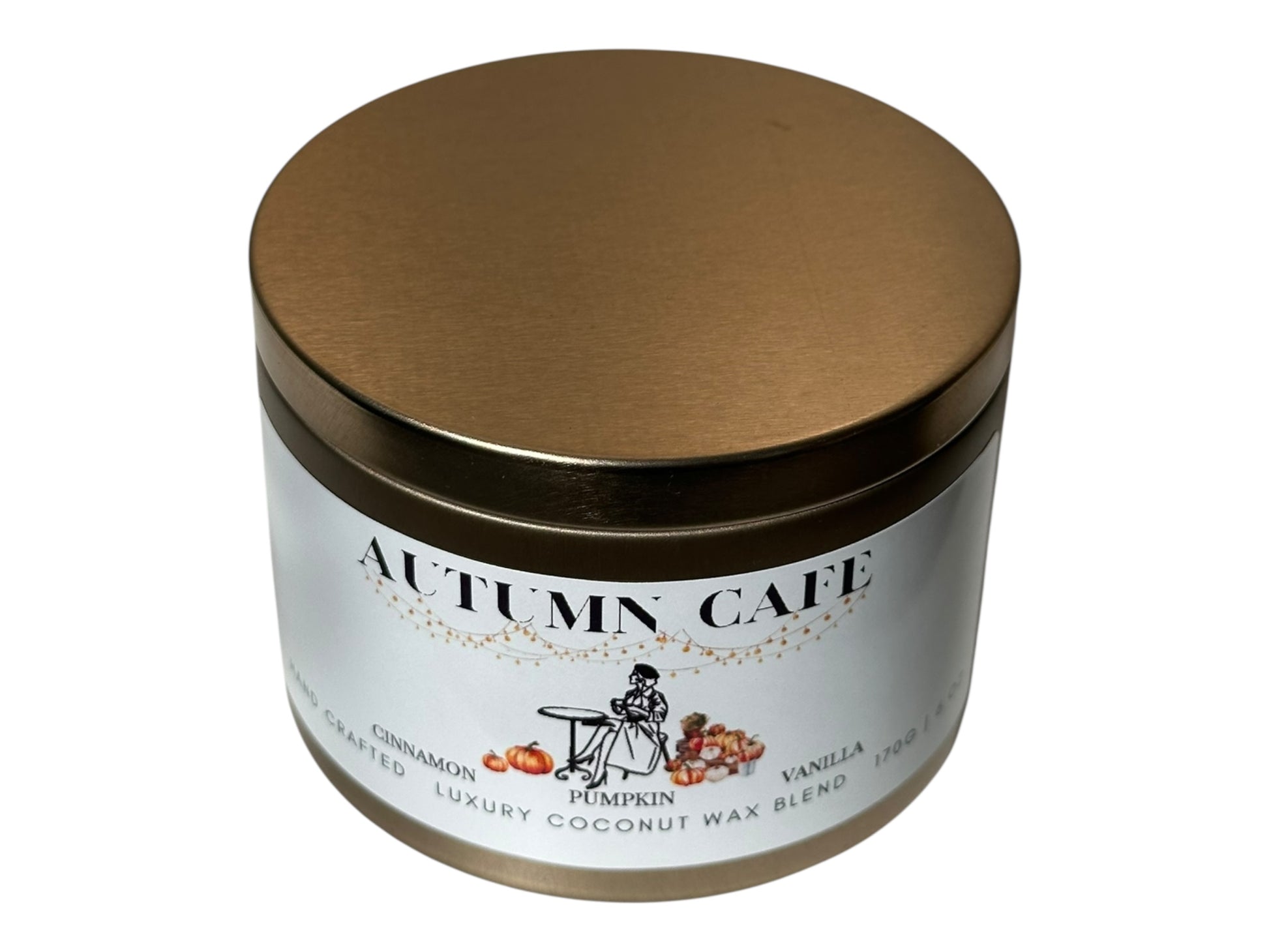 A gold candle tin labeled 'Autumn Cafe' with lid on a white background.