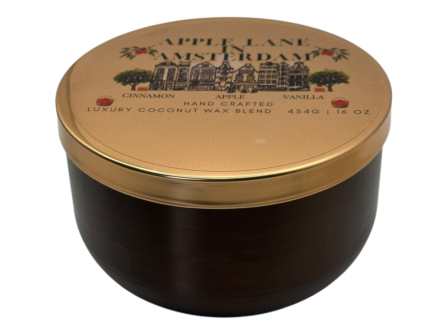 A bronze and gold candle tin labeled "Apple Lane in Amsterdam" with a decorative clear label on a white background.