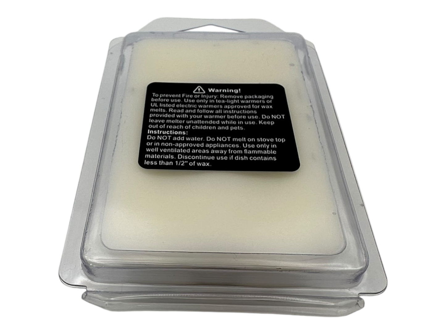 Packaged wax melts with a warning label on a white background