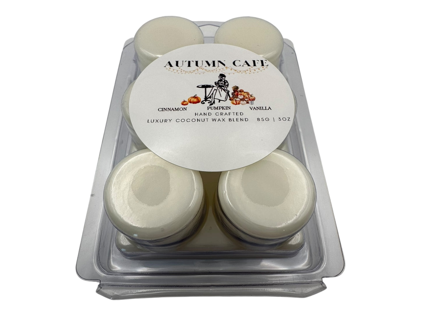 Pack of six wax melts in a clear plastic container with 'Autumn Cafe' label on a white background