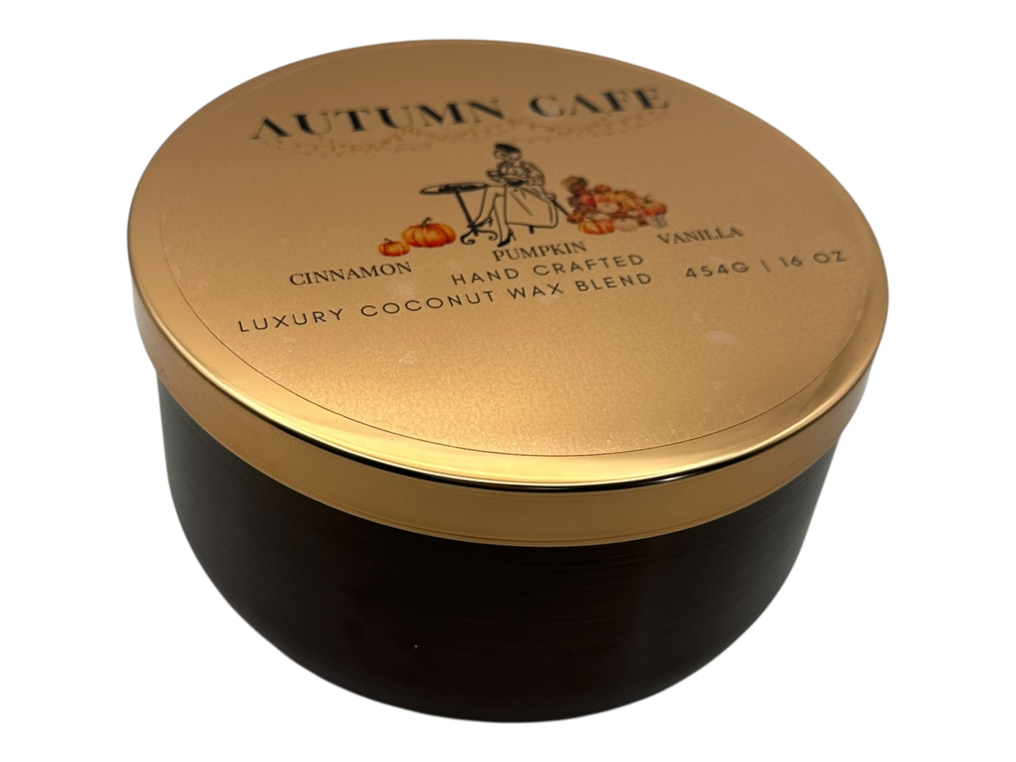 A gold and bronze candle tin labeled "Autumn Cafe" with a decorative clear label on a white background.