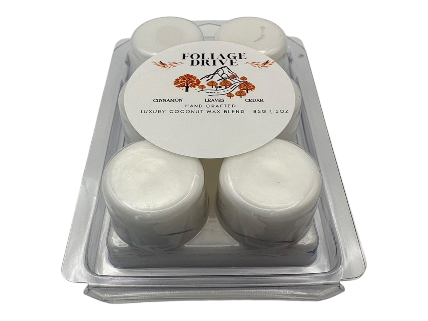 Six white cavity wax melt in a clear plastic packaging with 'Foliage Drive' label on a white background.