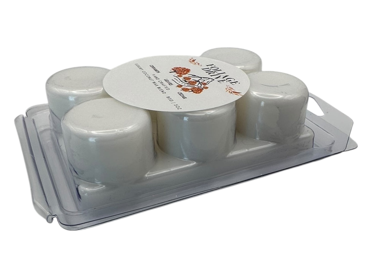 Set of six white wax melt in a clear plastic holder with a label on a white background