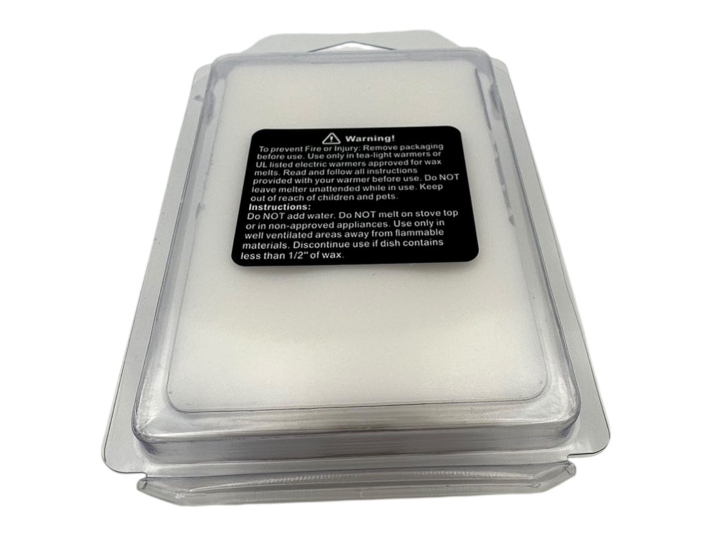 Packaged wax melts with a warning label on a white background