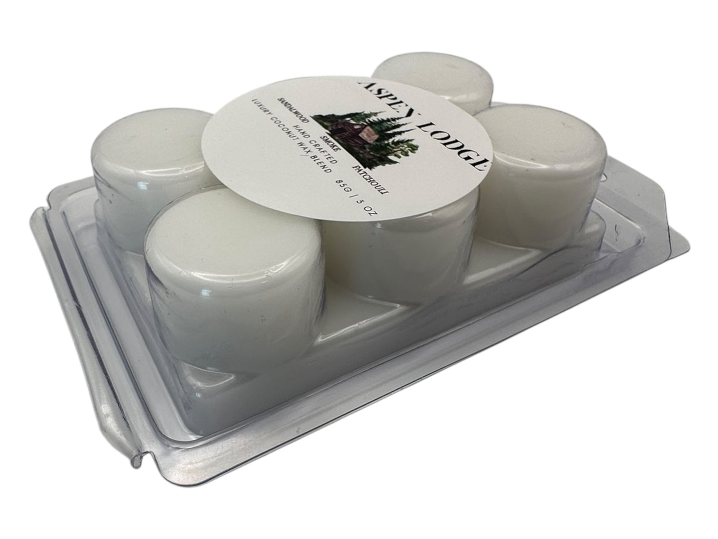 A package of Aspen Lodge Wax melts in plastic clamshell side view on a white background.