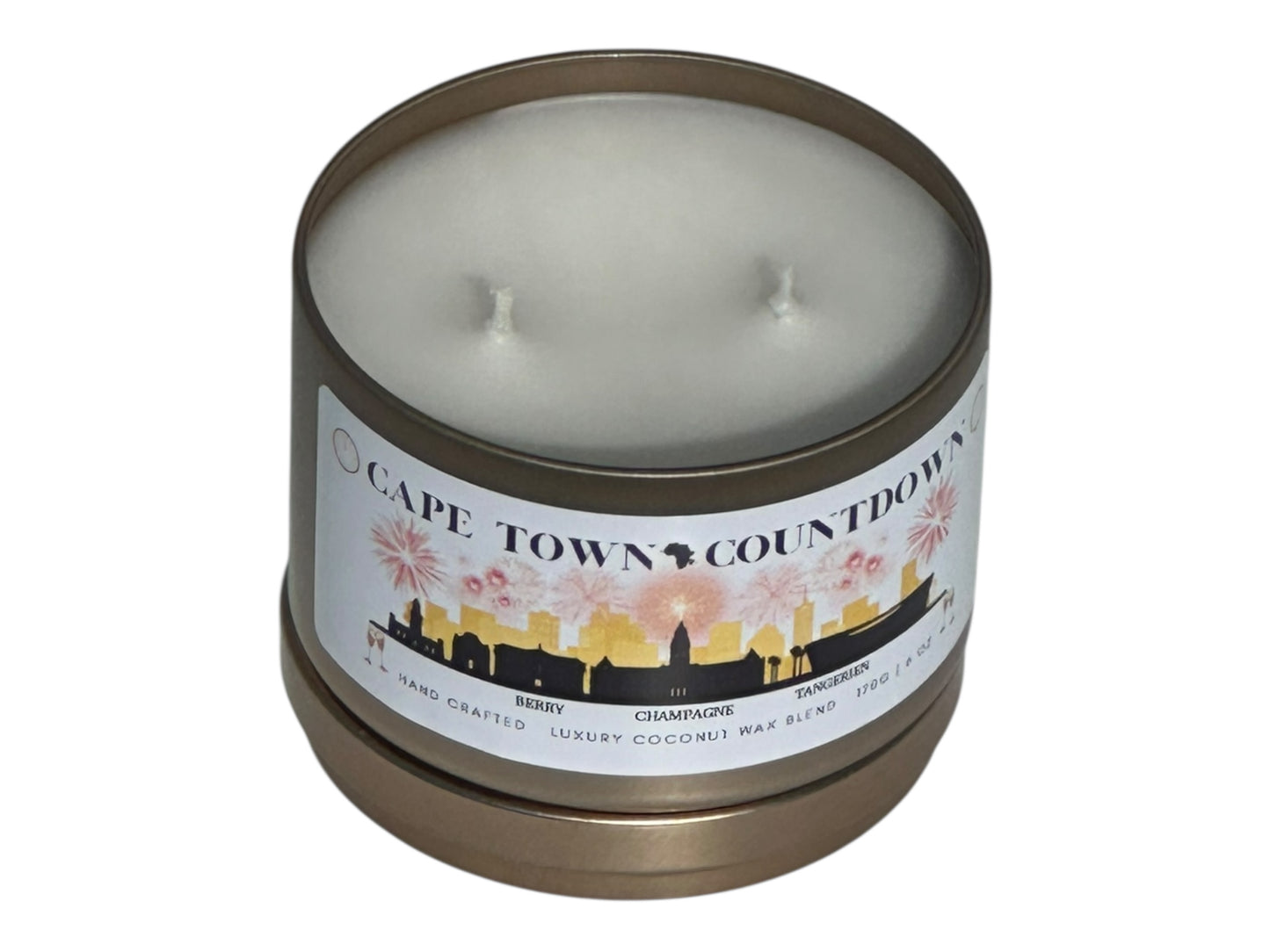 A new year's gold candle tin called, "Cape Town Countdown" on a white background with lid removed.