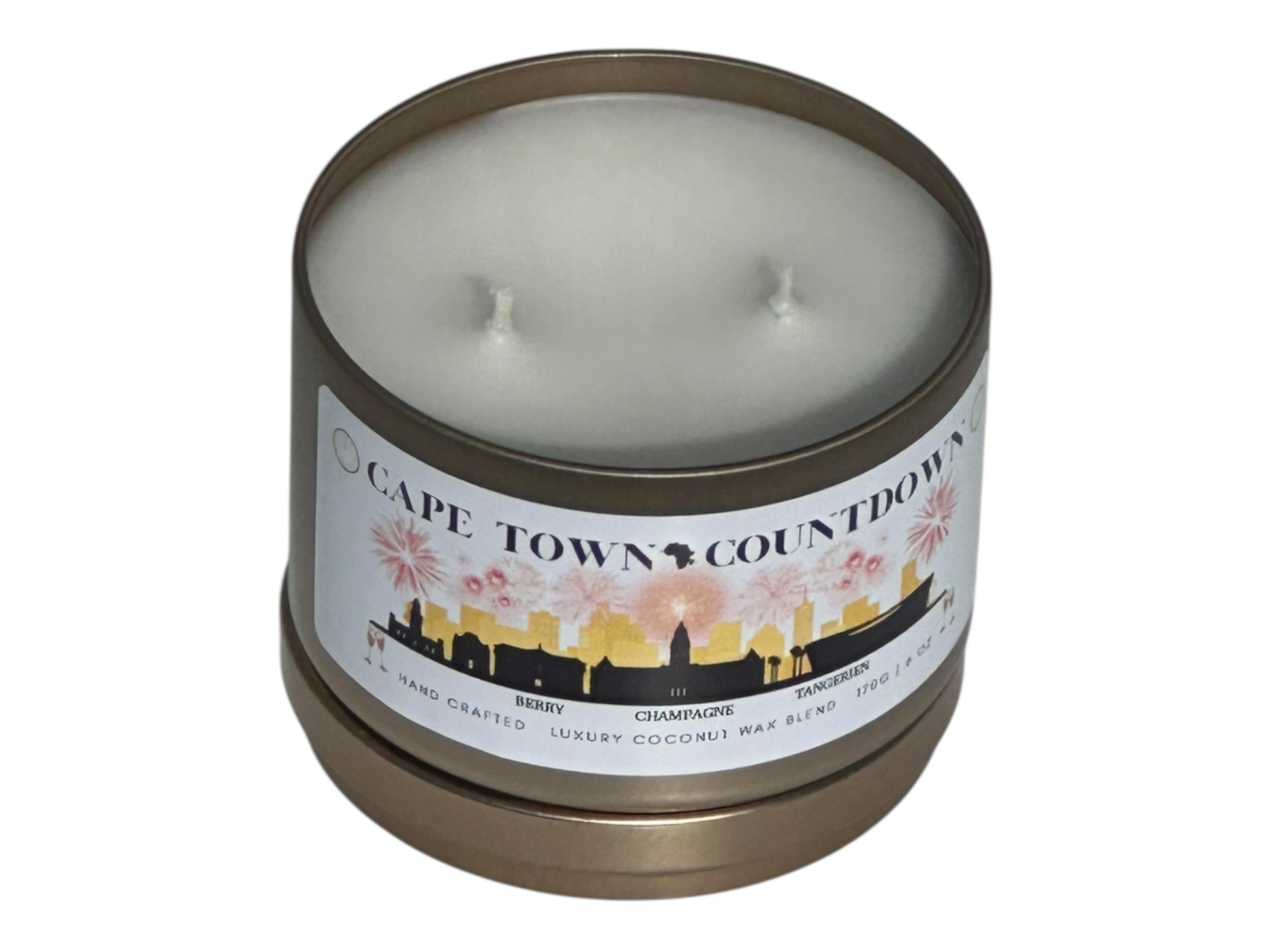 A new year's gold candle tin called, "Cape Town Countdown" on a white background with lid removed.