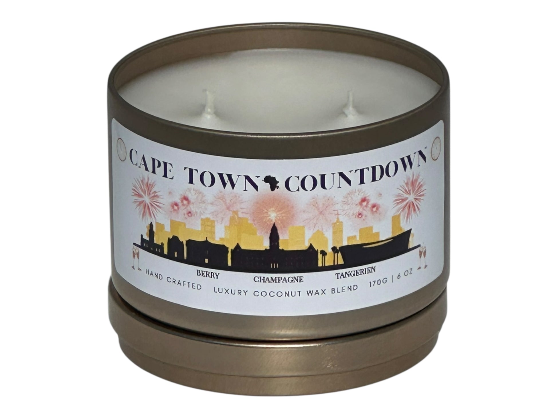A new year's gold candle tin called, "Cape Town Countdown" on a white background with lid removed.