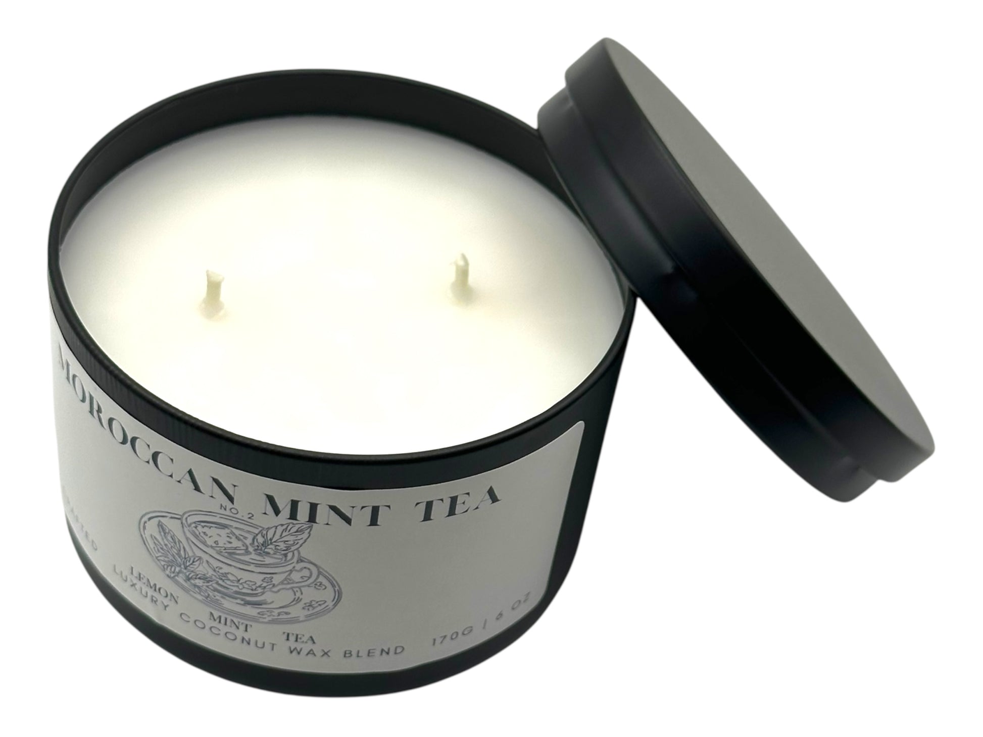 Candle in a Moroccan Mint Tea container with a black lid on a white background