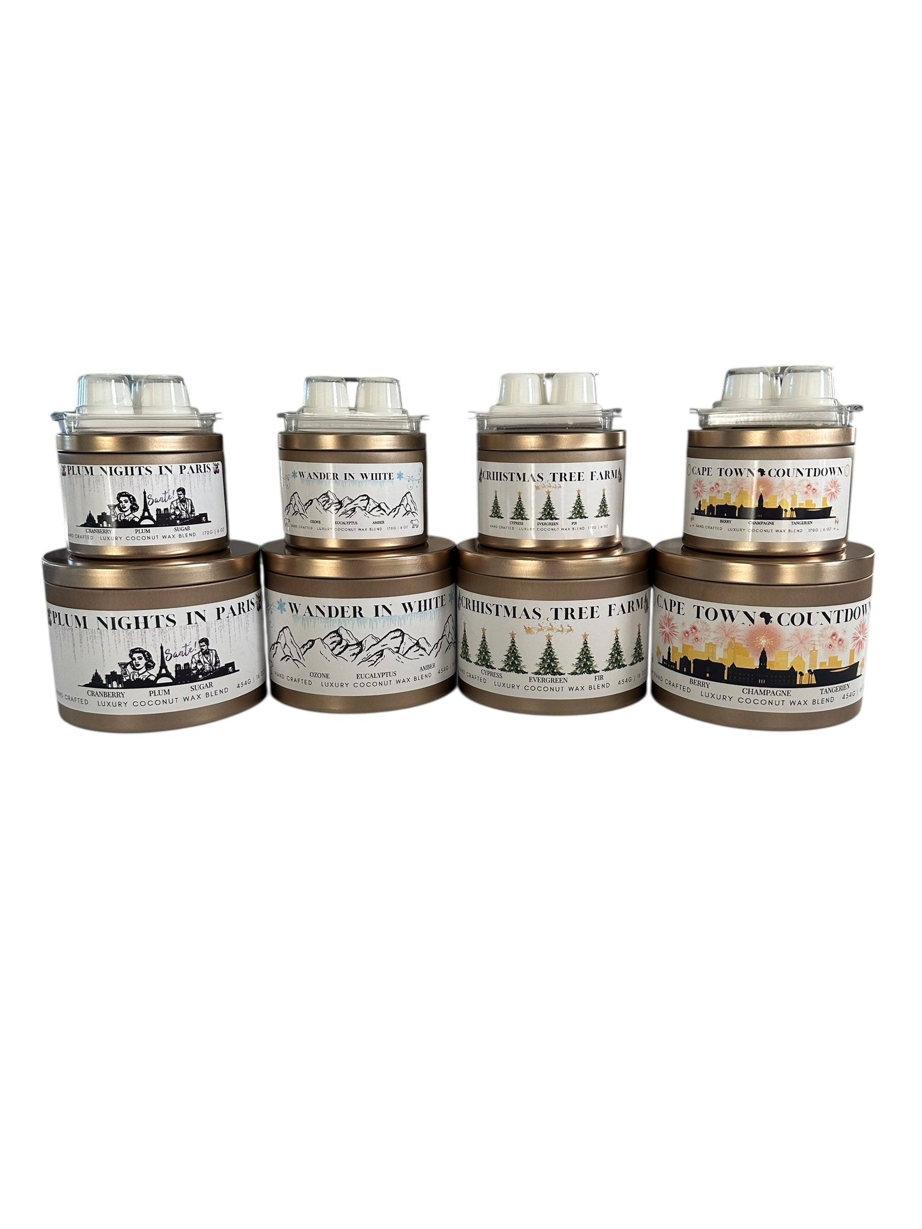 A holiday collection of gold candle tins and white coconut wax melts labeled "Plum Nights in Paris", "Wander in White", "Christmas Tree Farm", "Cape Town Countdown" on a white background.