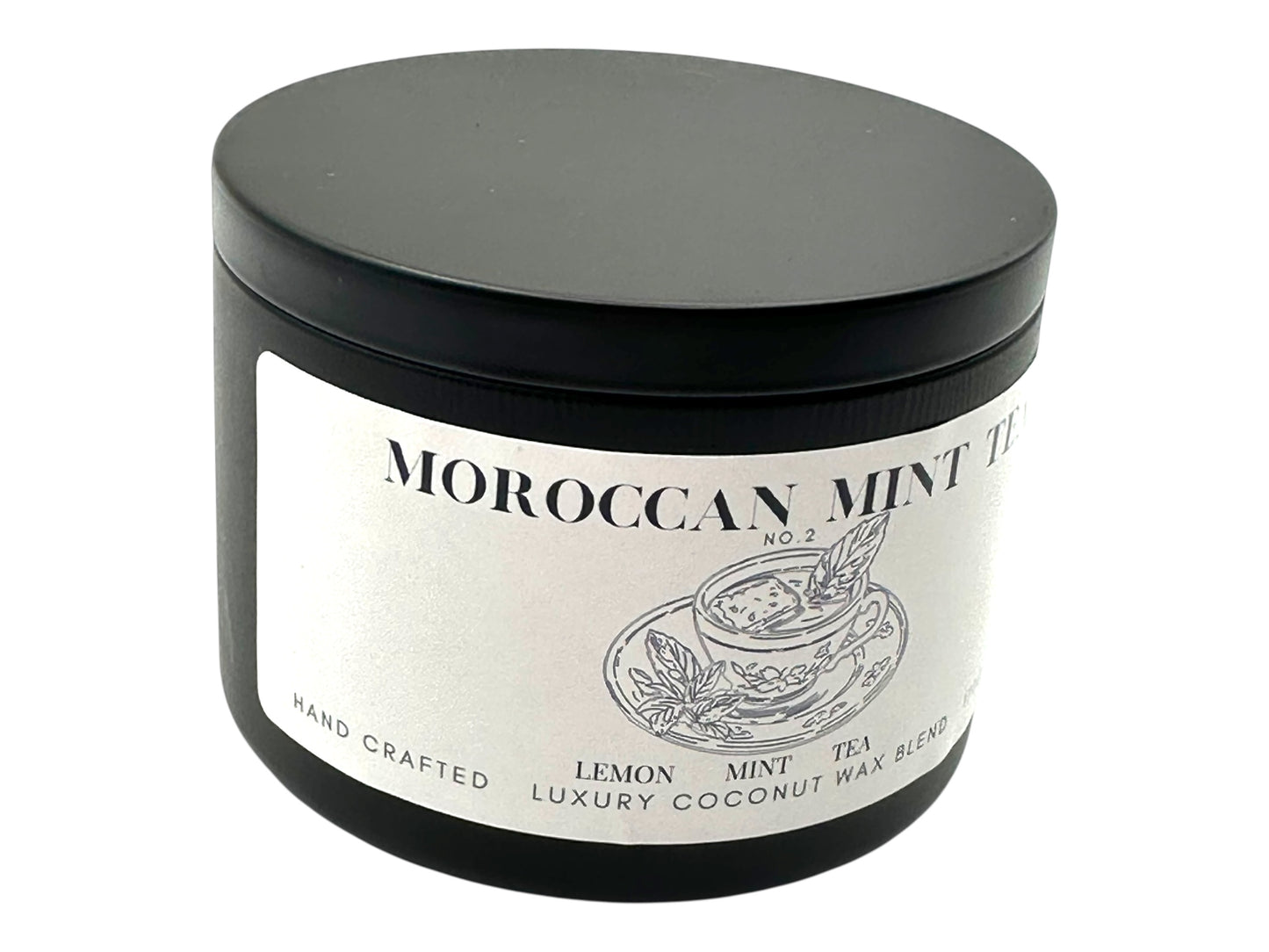 A black candle tin in side view labeled Moroccan Mint Tea on a white background.