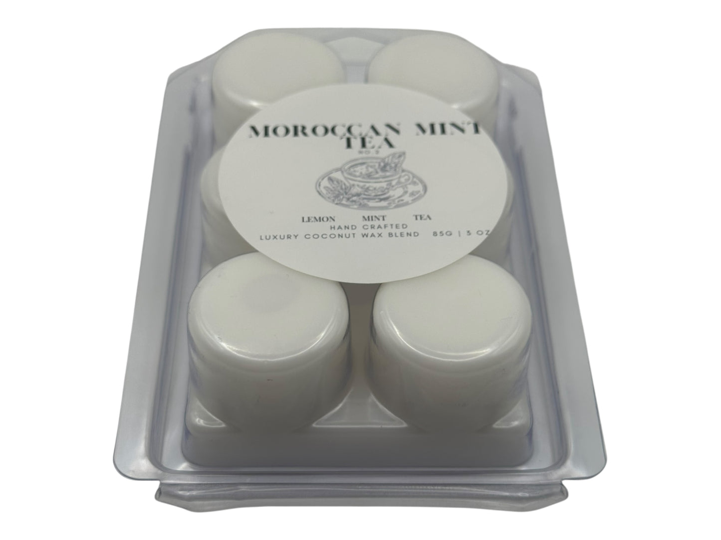 Pack of Moroccan Mint Tea wax melts in a clear plastic container on a white background