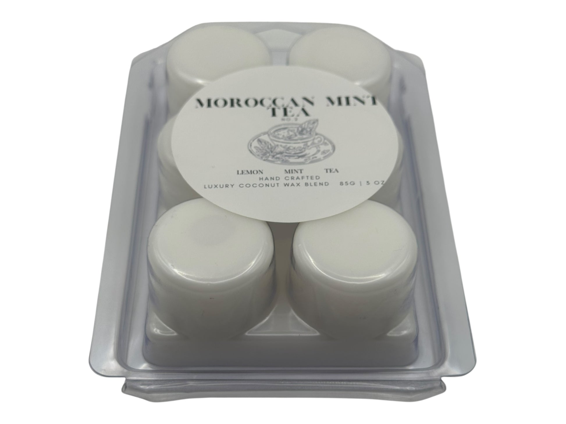 Pack of Moroccan Mint Tea wax melts in a clear plastic container on a white background