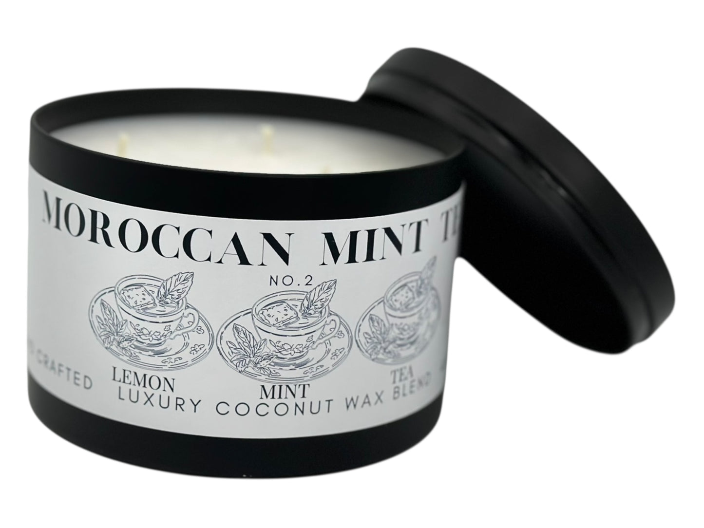 Candle labeled 'Moroccan Mint Tea' with a black lid on a white background