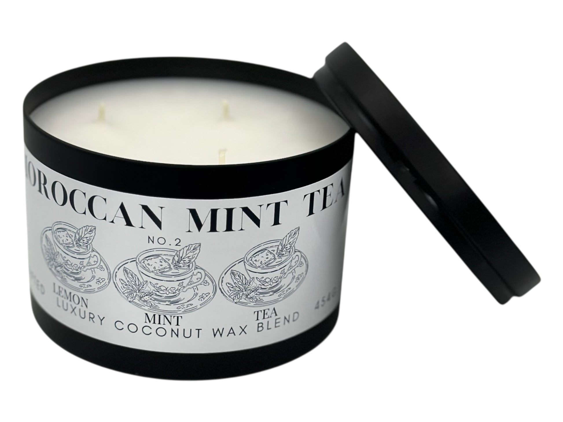 Candle in a tin labeled 'Moroccan Mint Tea' with a black lid on a white background
