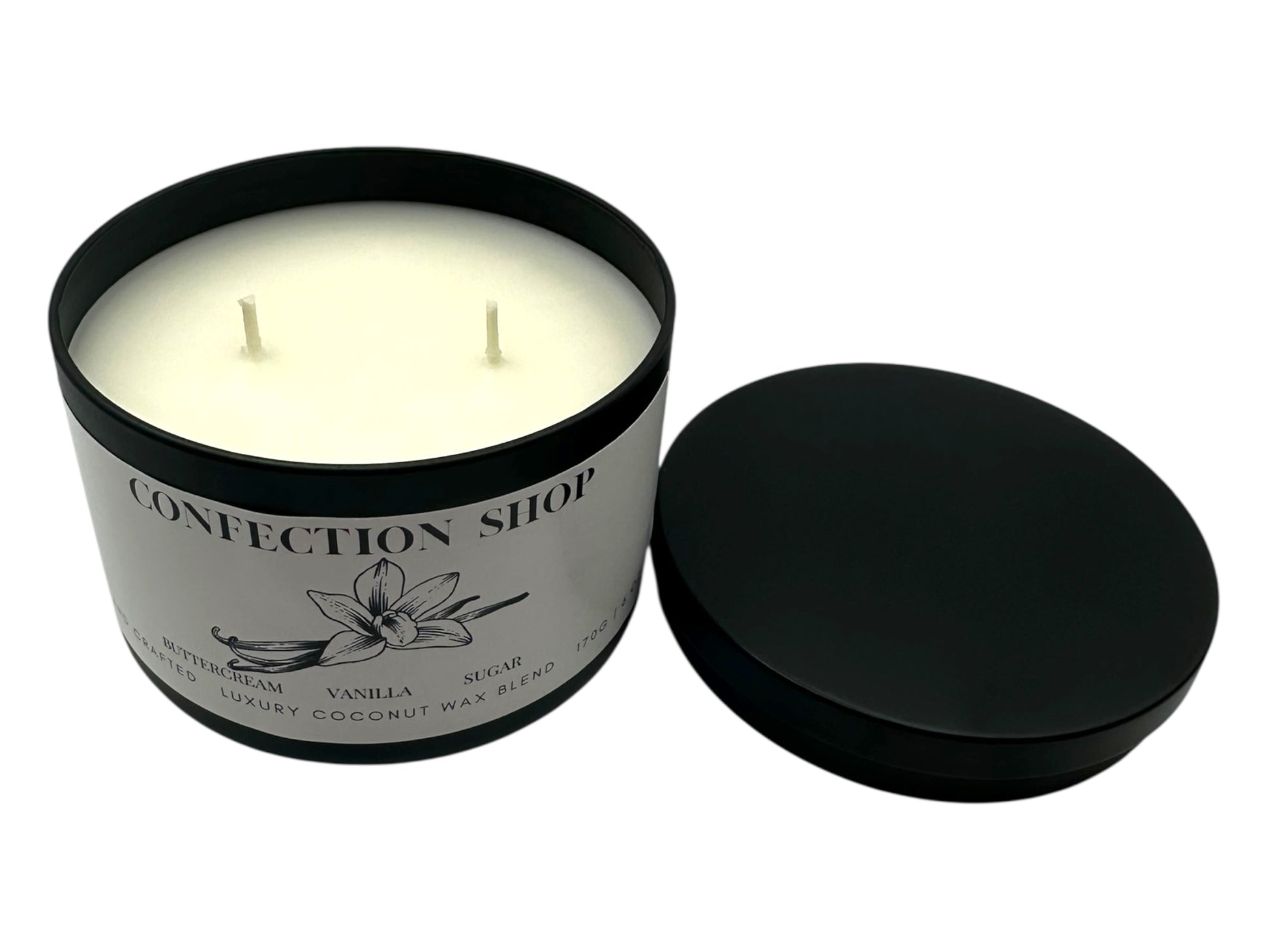 A black candle tin labeled "Confection Shop" lid removed on a white background. 