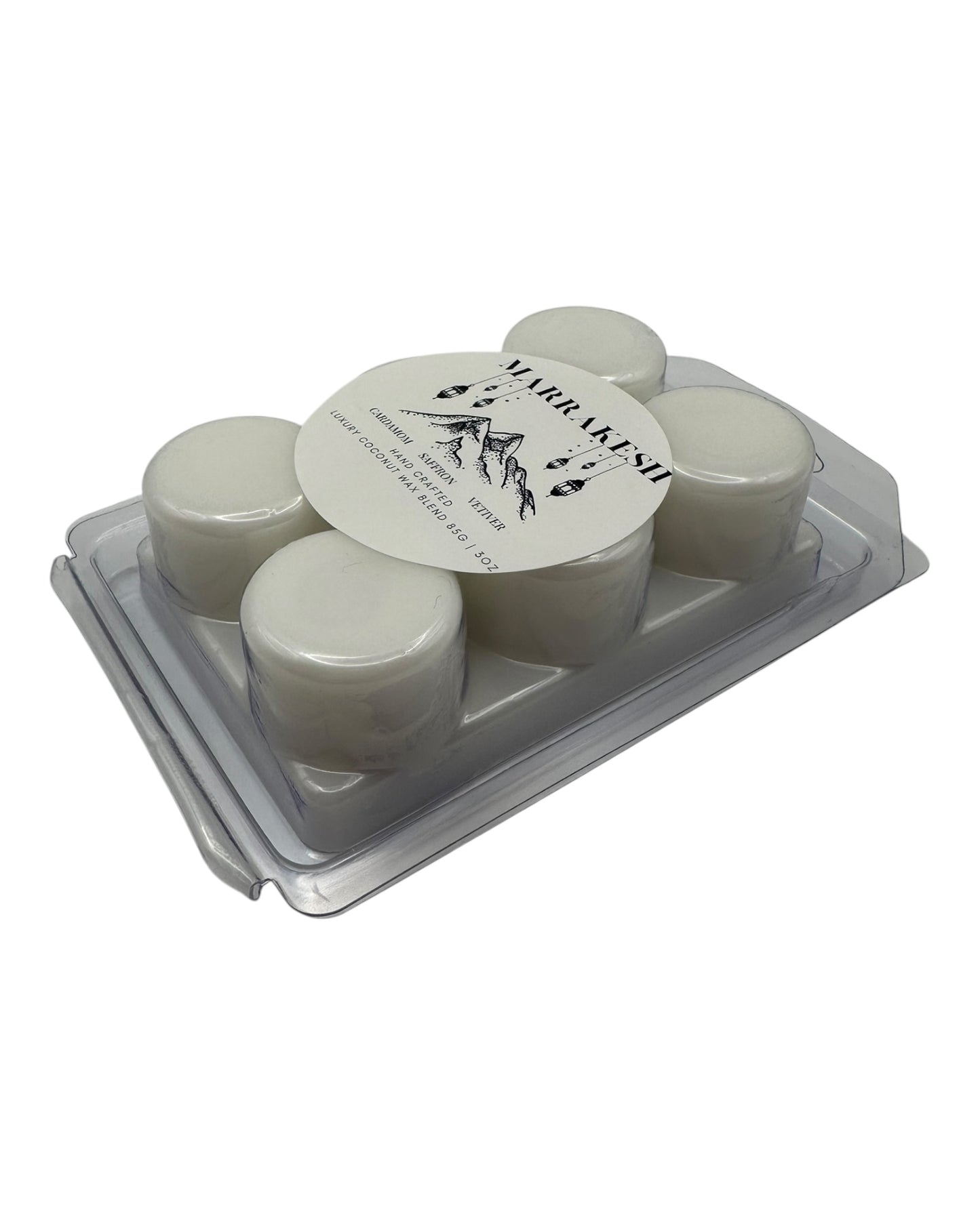 A plastic clamshell white wax melts labeled "Marrakesh" on a white background. 