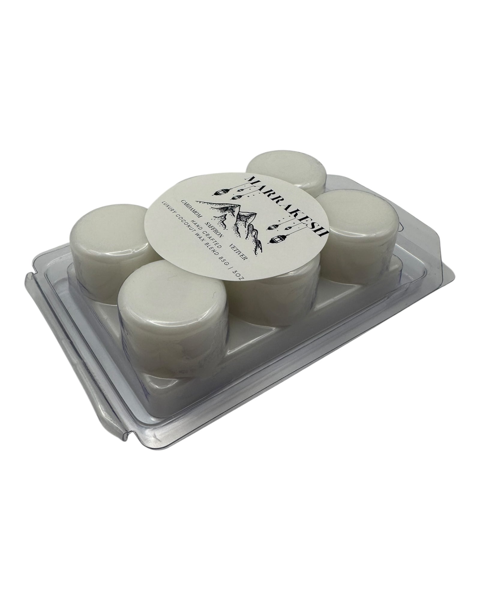 A plastic clamshell white wax melts labeled "Marrakesh" on a white background. 