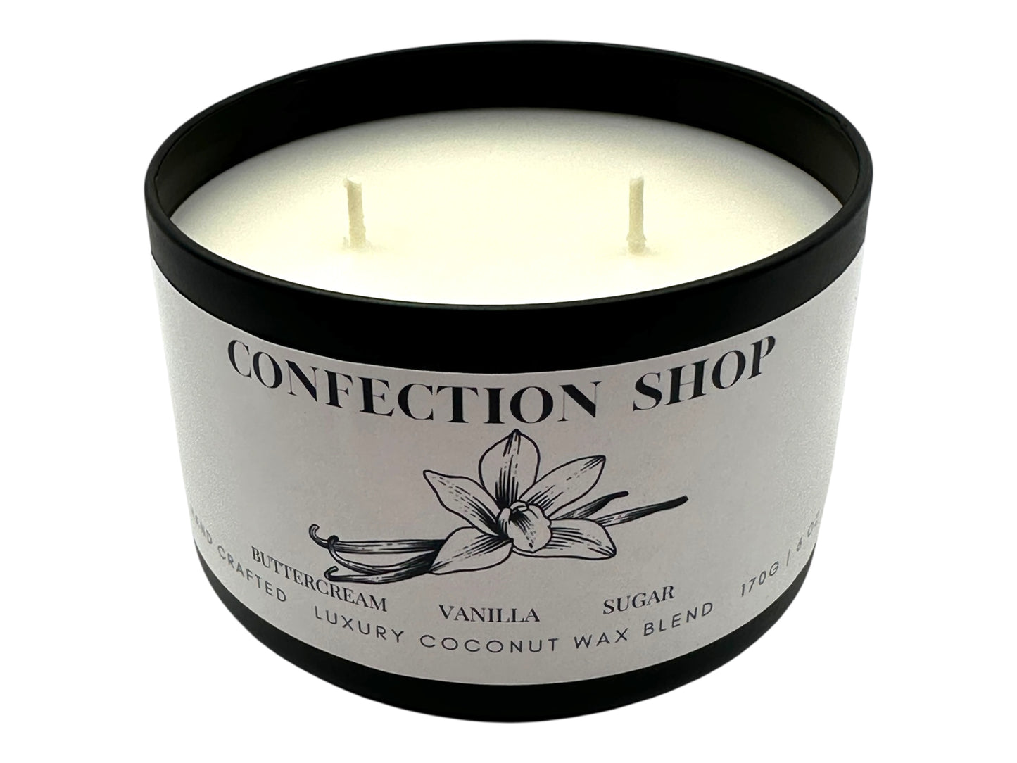 A black candle tin labeled "Confection Shop" with two wicks and a smooth white candle top on a white background. 
