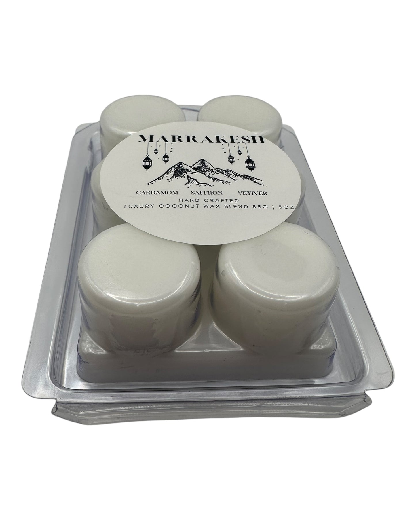 A plastic clamshell white wax melts labeled "Marrakesh" on a white background. 