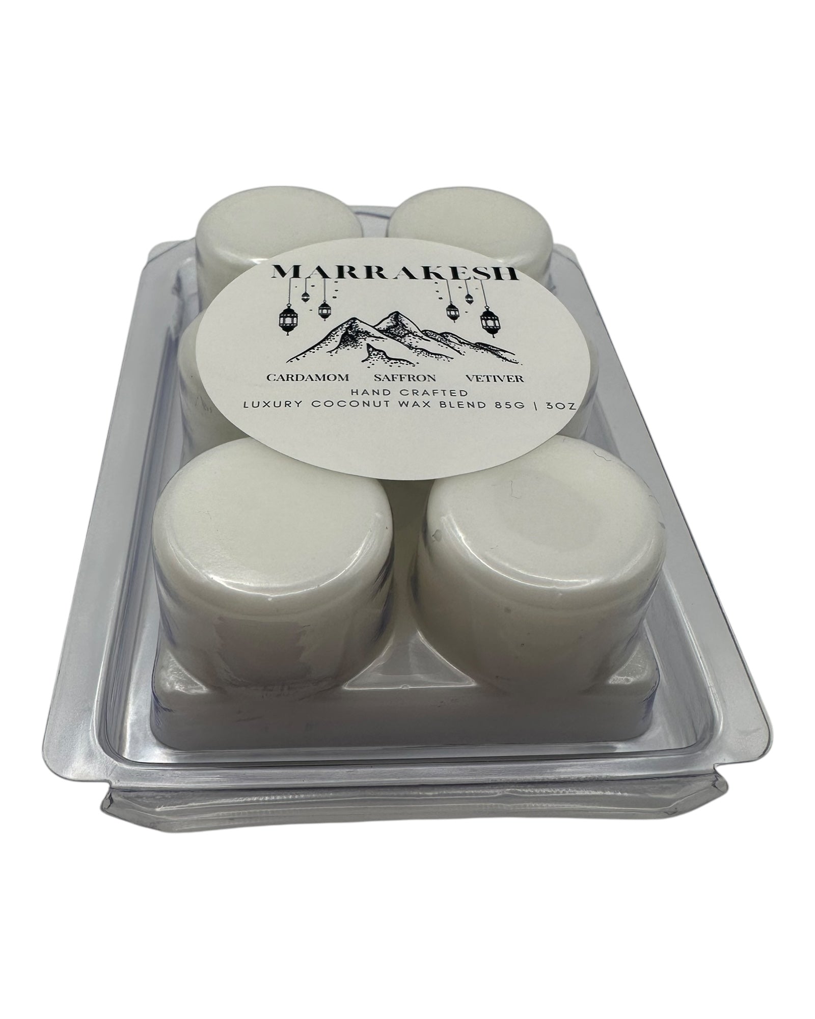 A plastic clamshell white wax melts labeled "Marrakesh" on a white background. 