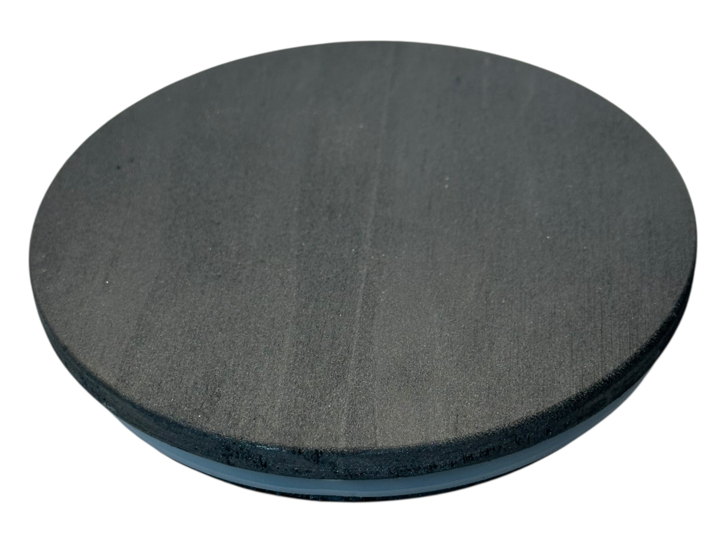 A pearl black wooden candle lid on a white background.