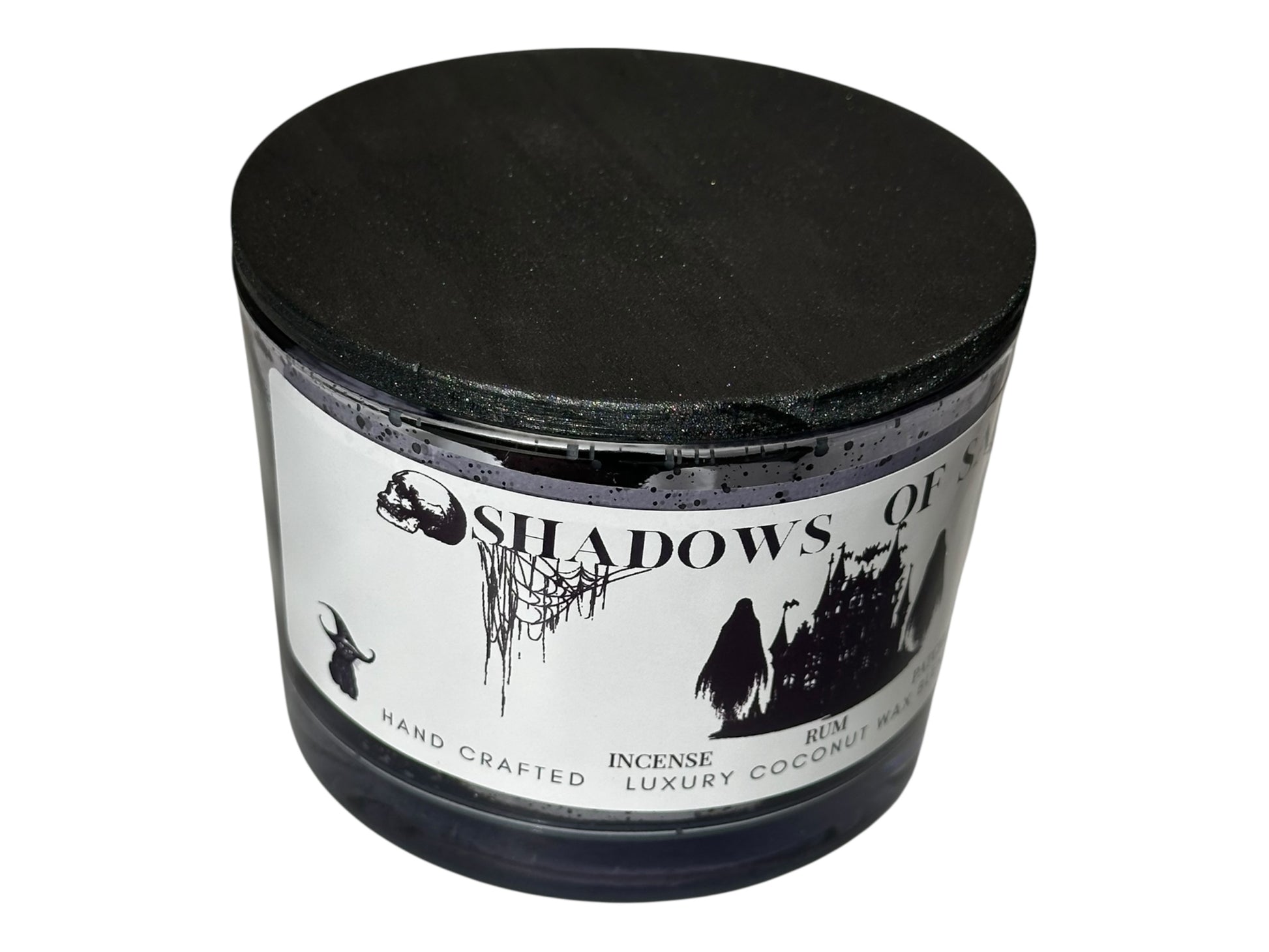 A purple candle jar  with a label on a white background.