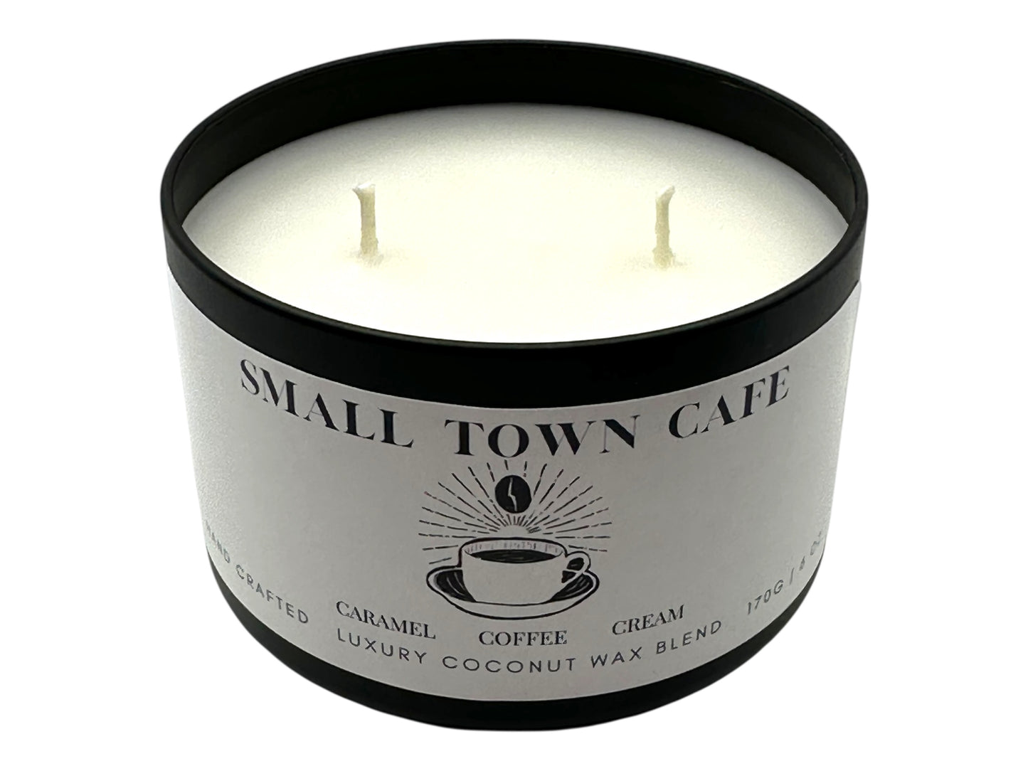 A black candle tin labeled "Small Town Cafe" with lid removed on a white background.