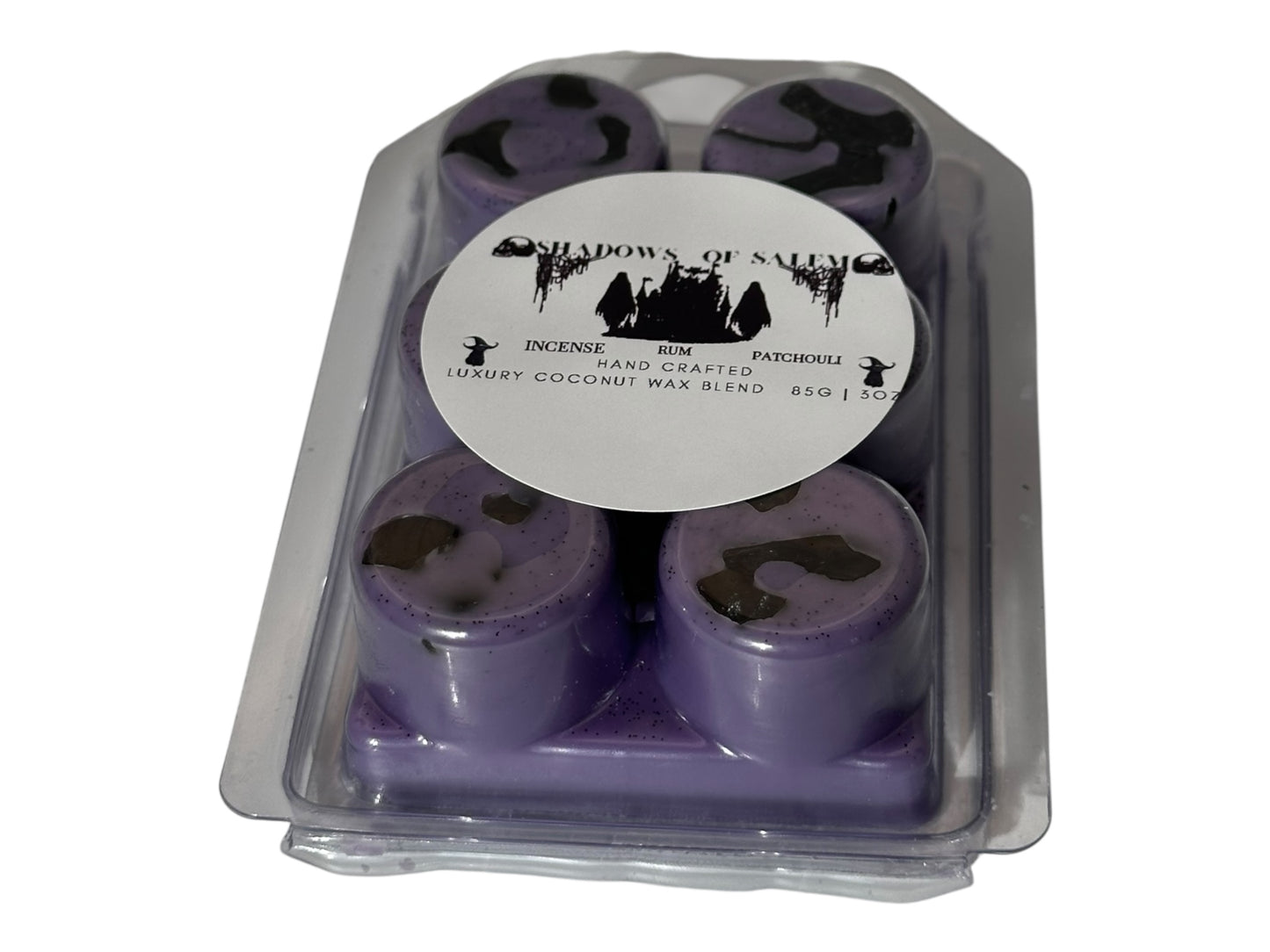 A package of purple wax melts labeled "Shadows of Salem" on a white background. 