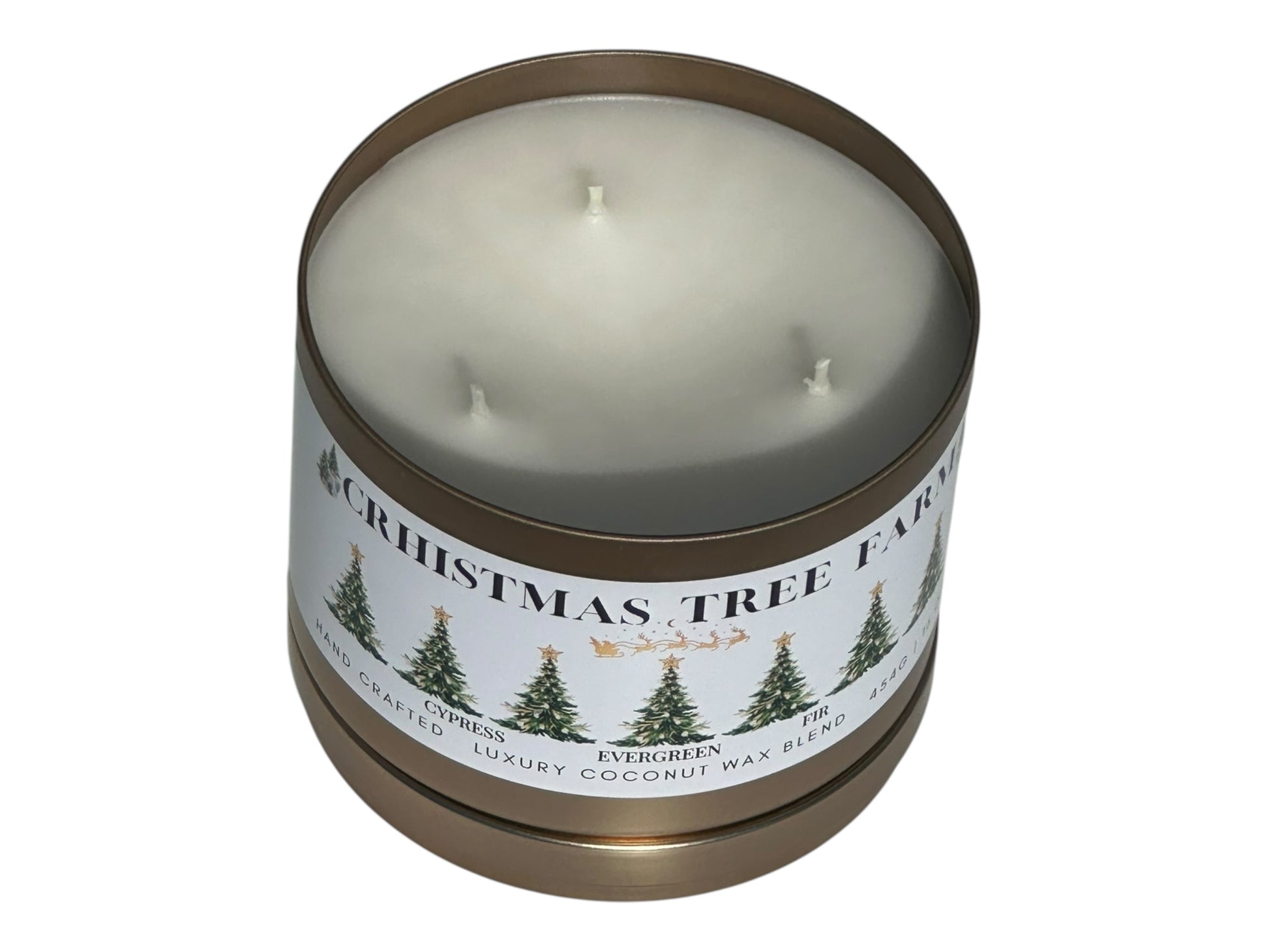 A gold candle tin labeled "Christmas  Tree Farm" on a white background top view with the candle lid removed showing three candle wicks.