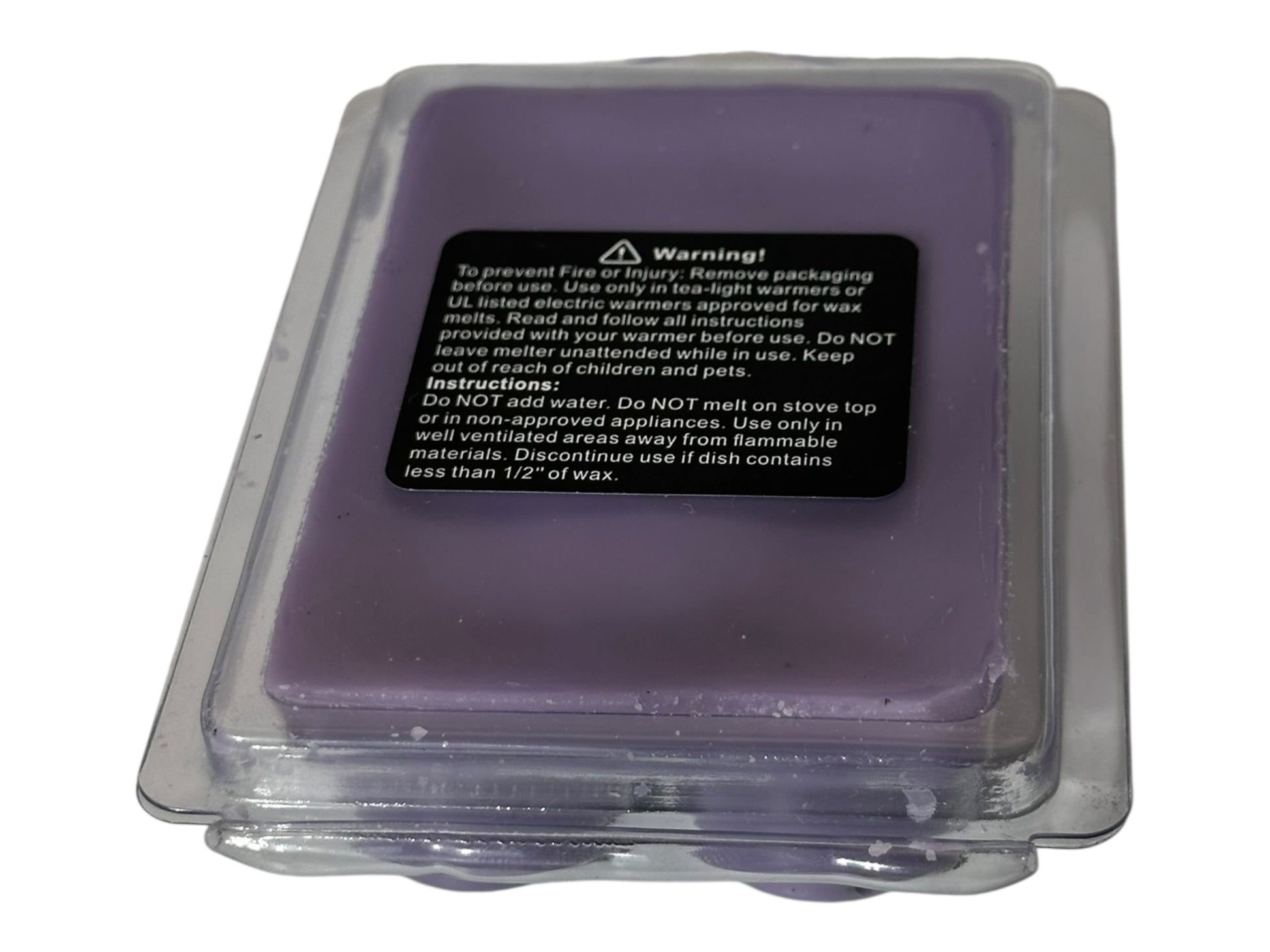 Purple wax block in a clear container with warning label on a white background.