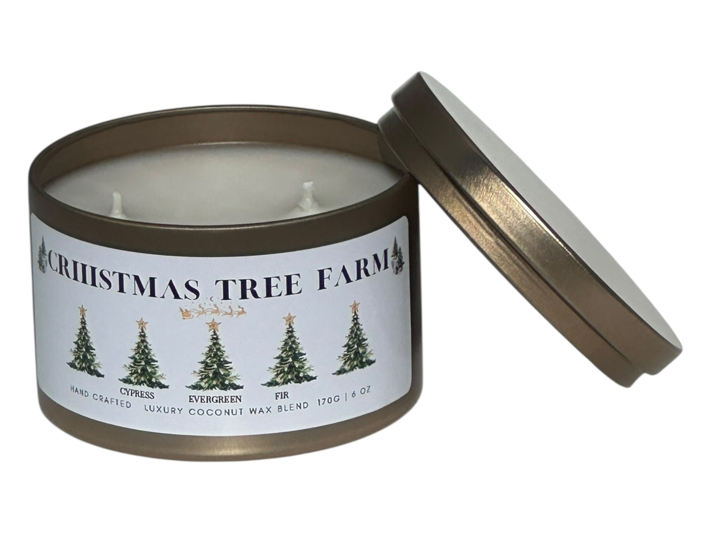 a gold candle tin labeled "Christmas Tree Farm" with lid removed on a white background.