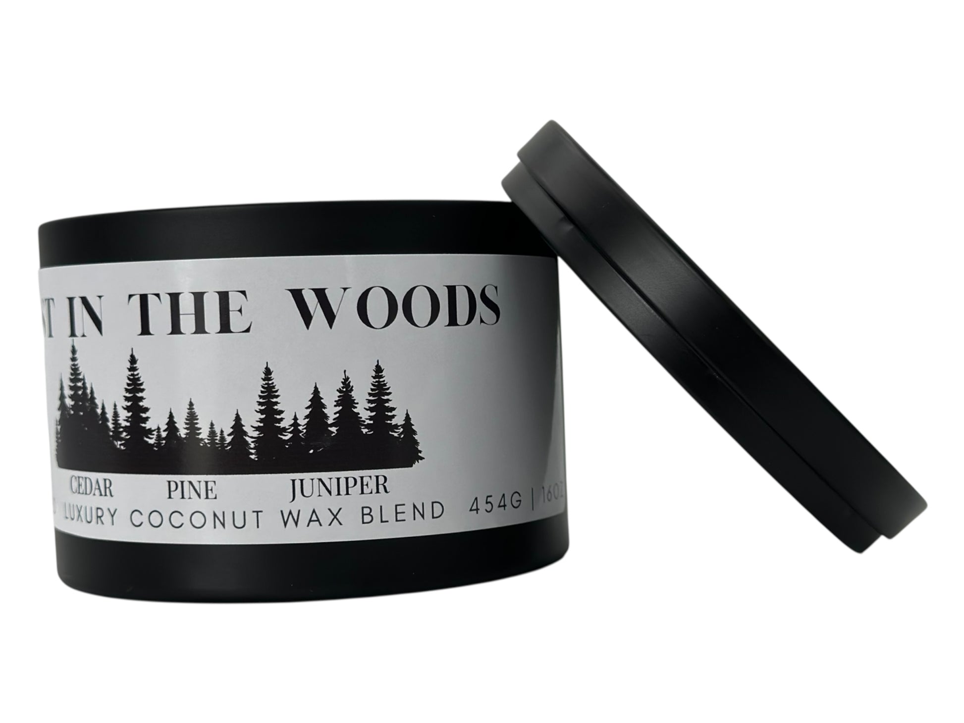 A black candle tin labeled "Lost in the Woods" on a white background.