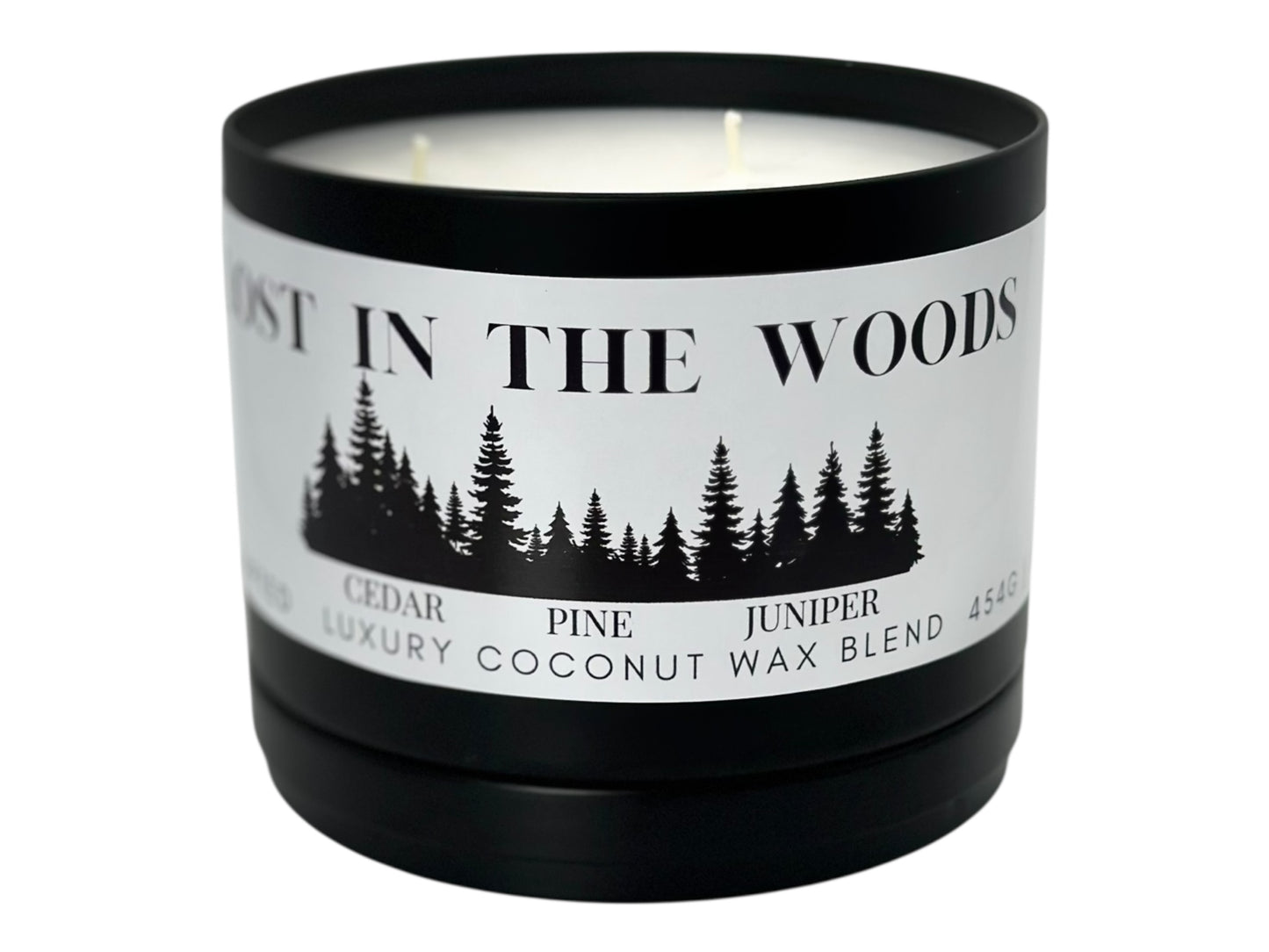 A black candle tin labeled "Lost in the Woods" with lid removed on a white background.