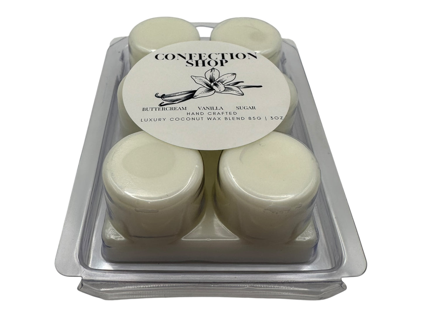 A package of  Confection Shop wax melts in a clear plastic clamshell on a white background.