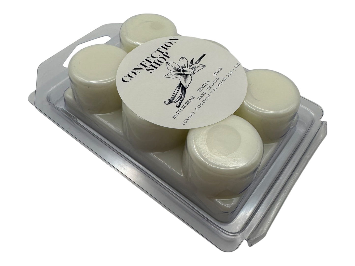 A side view of  package of  Confection Shop wax melts in a clear plastic clamshell on a white background.