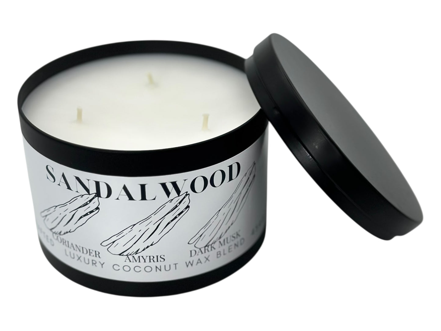A black candle tin labeled "Sandalwood" with lid removed on a white background.