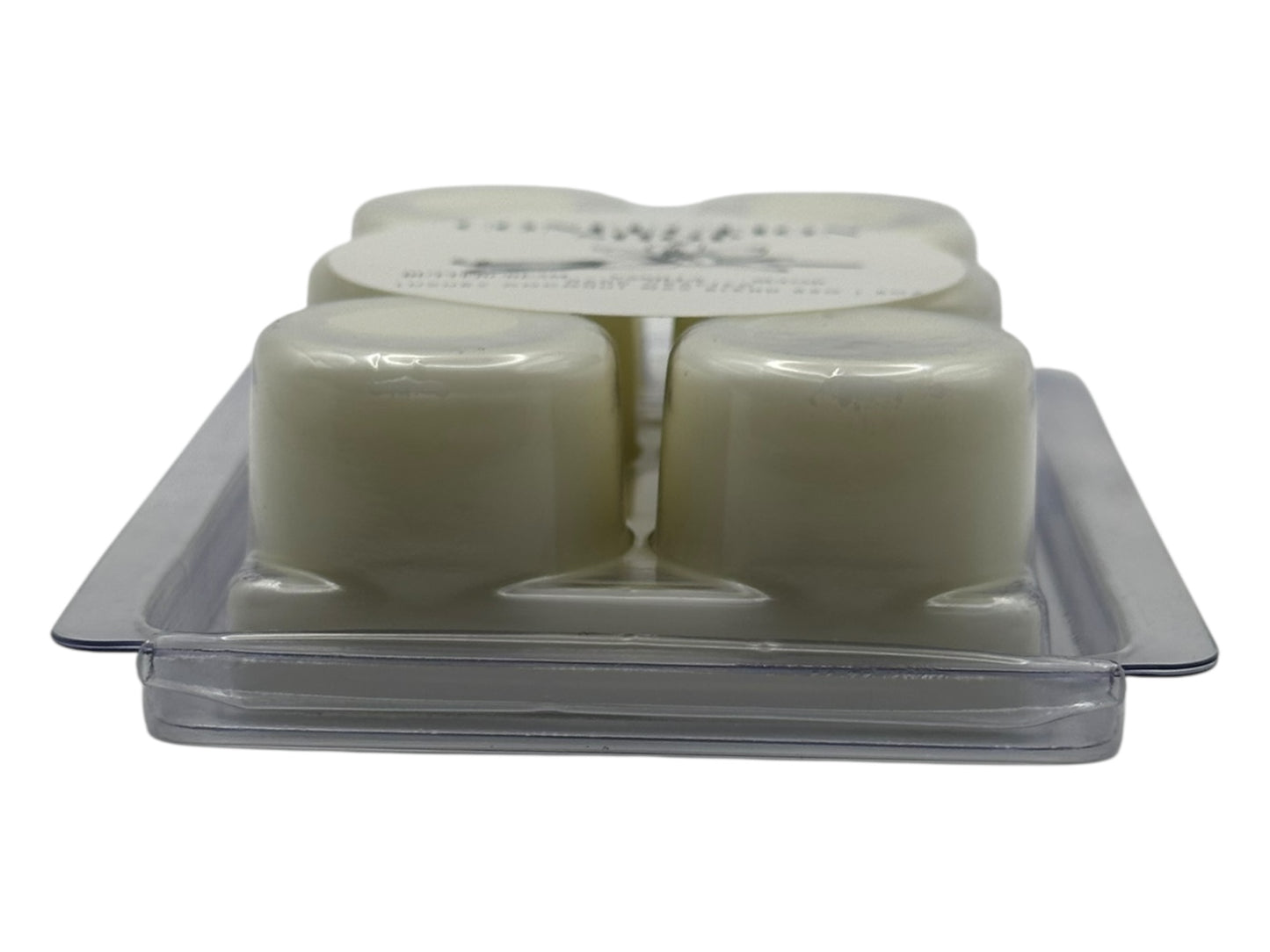 A package of wax melts in a clear plastic clamshell on a white background.