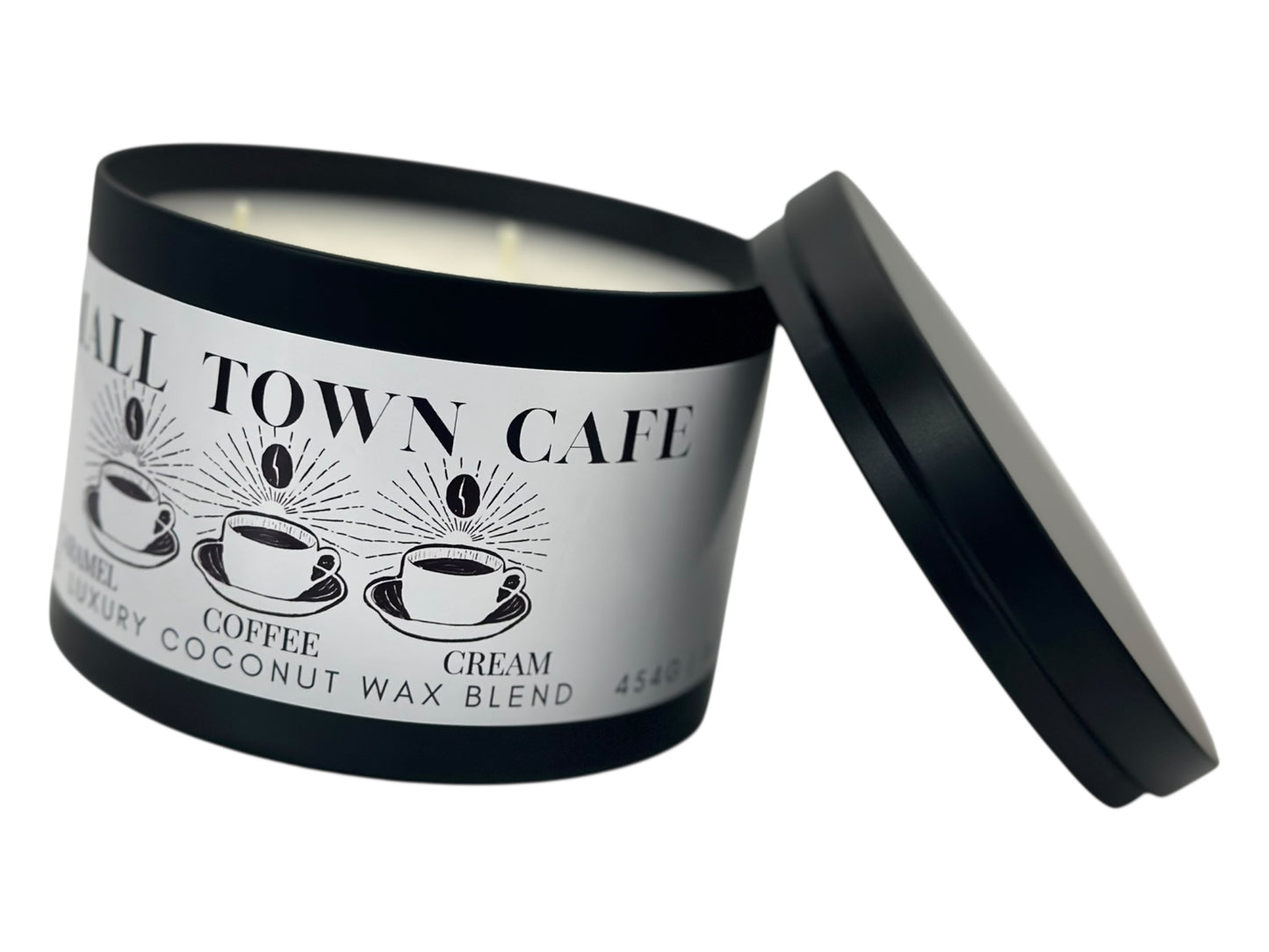 A black candle tin labeled "Small Town Cafe" with lid removed on a white background.
