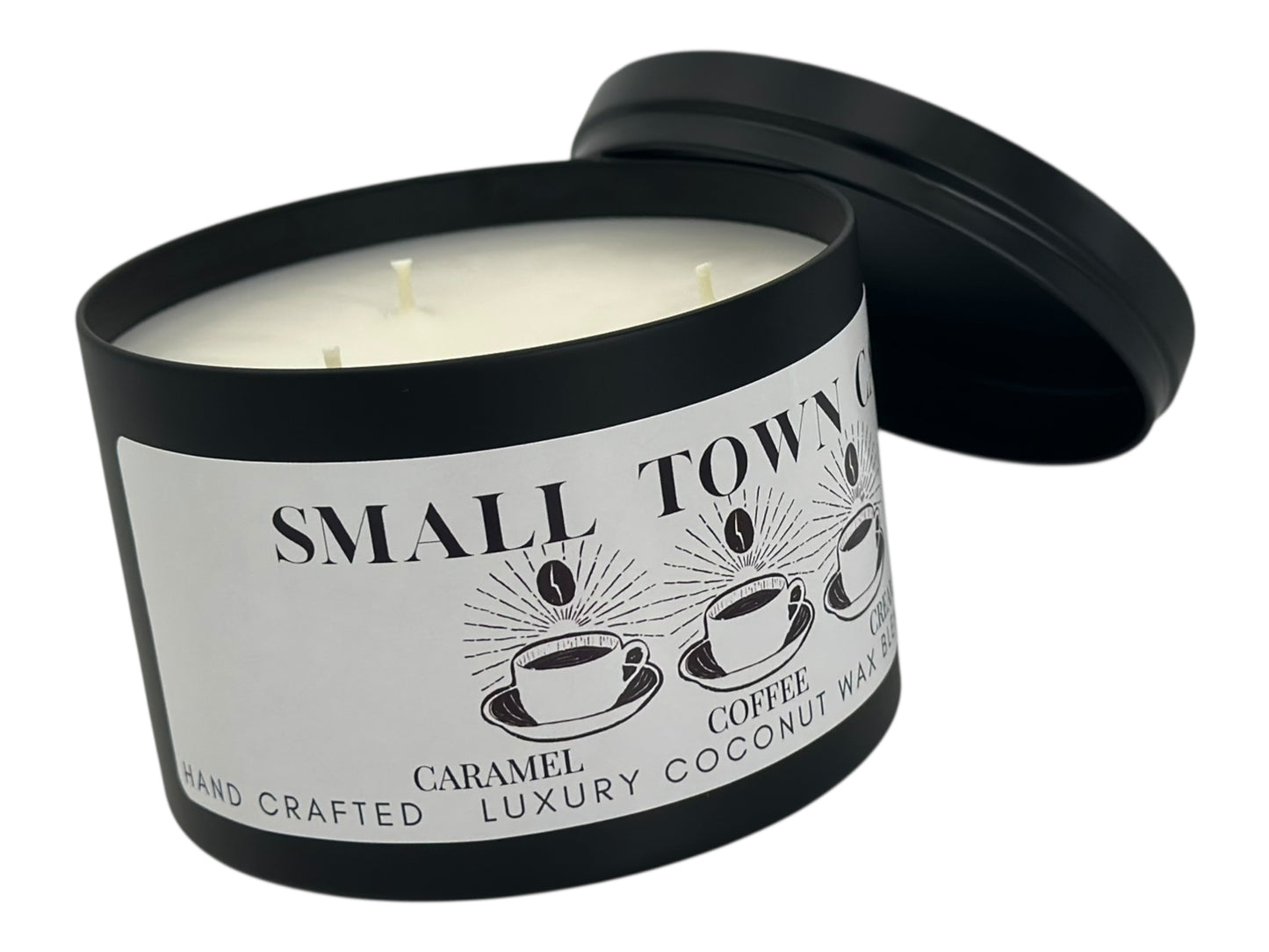 A black candle tin labeled "Small Town Cafe" on a white background.