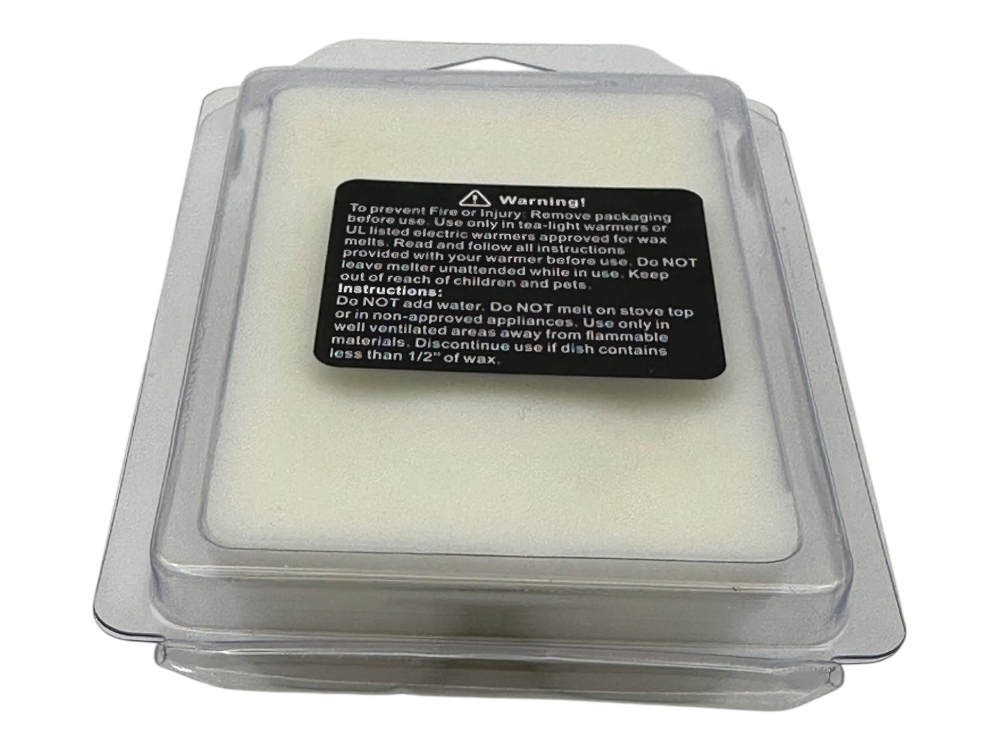 Packaged wax melt with warning label on a white background.