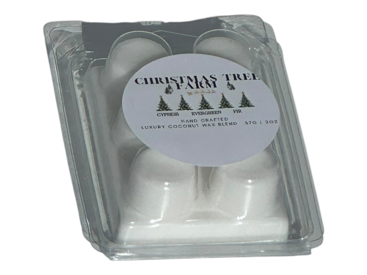 A winter wax melt labeled "Christmas Tree Farm" on a white background at an angle to show depth with natural lighting.