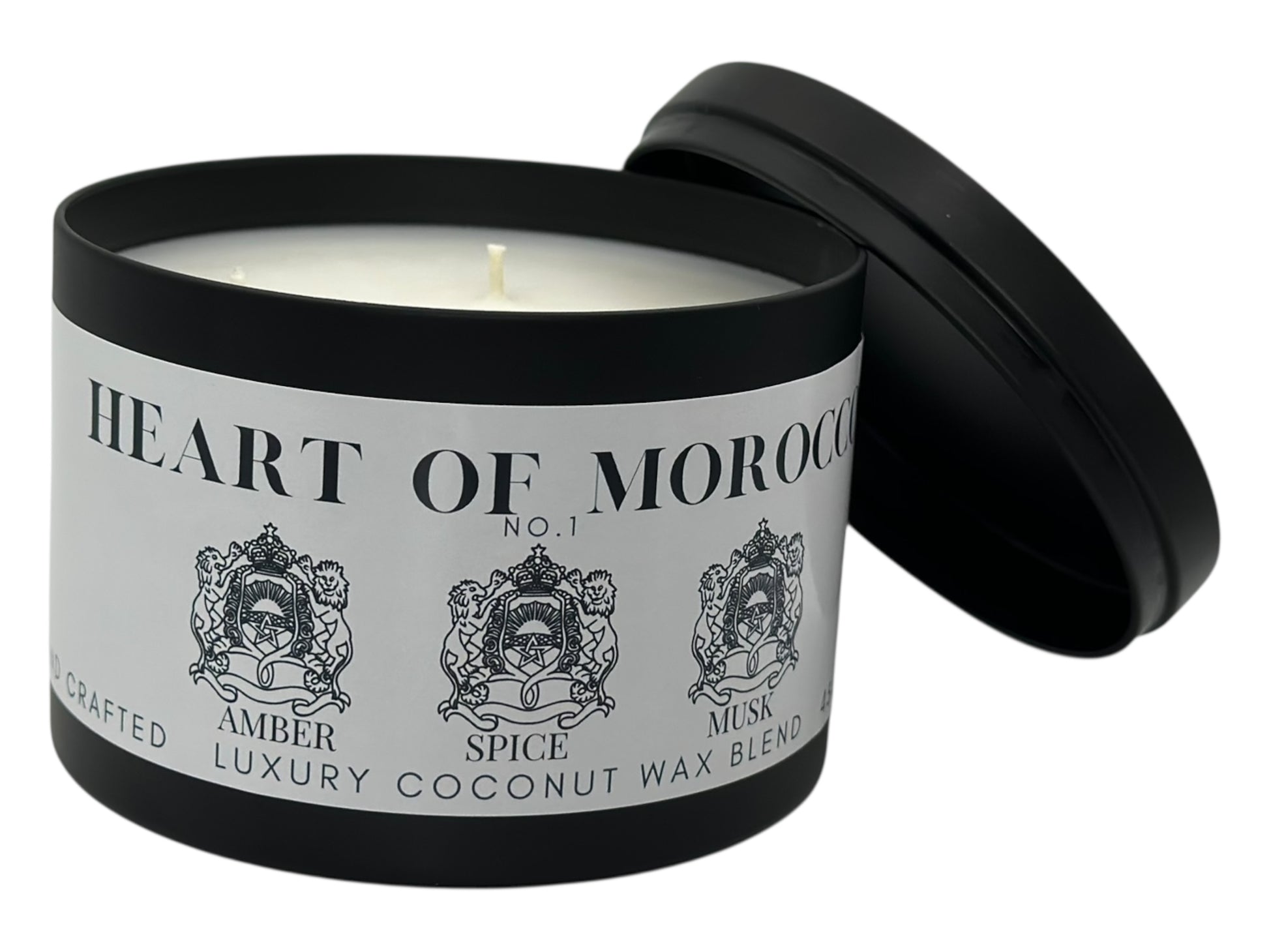 A black candle tin labeled "Heart of Morocco" lid removed on a white background.