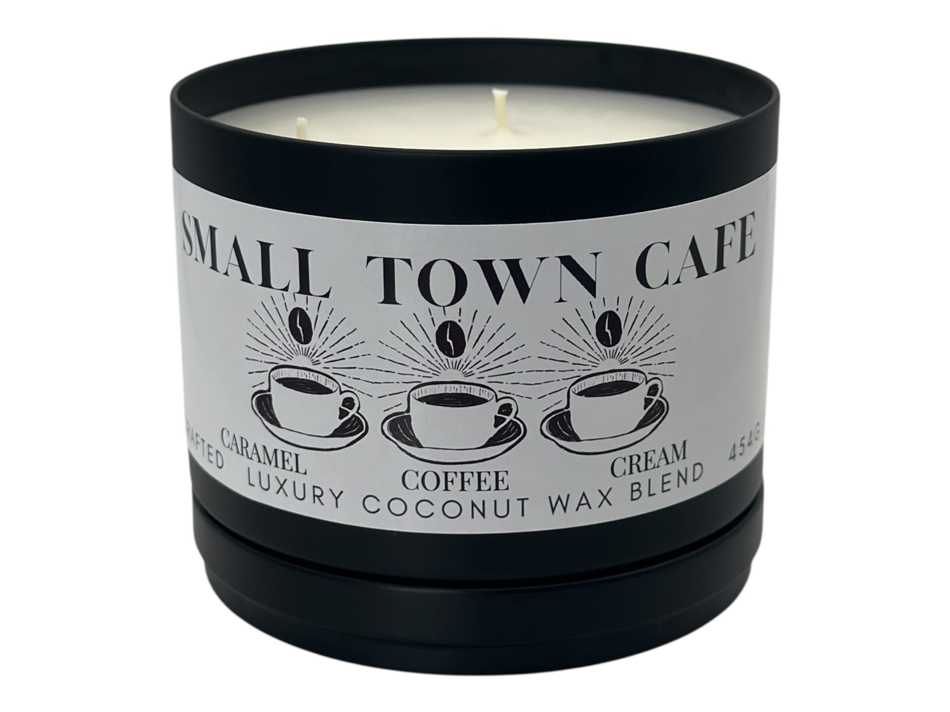 A black candle tin labeled "Small Town Cafe" with lid removed on a white background.