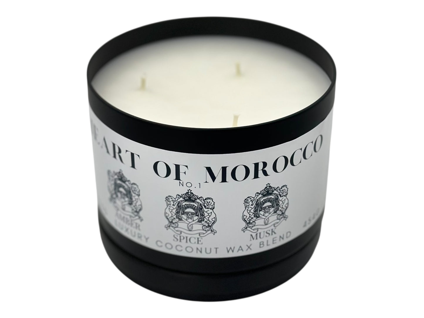 A black candle tin labeled "Heart of Morocco" lid removed on a white background.