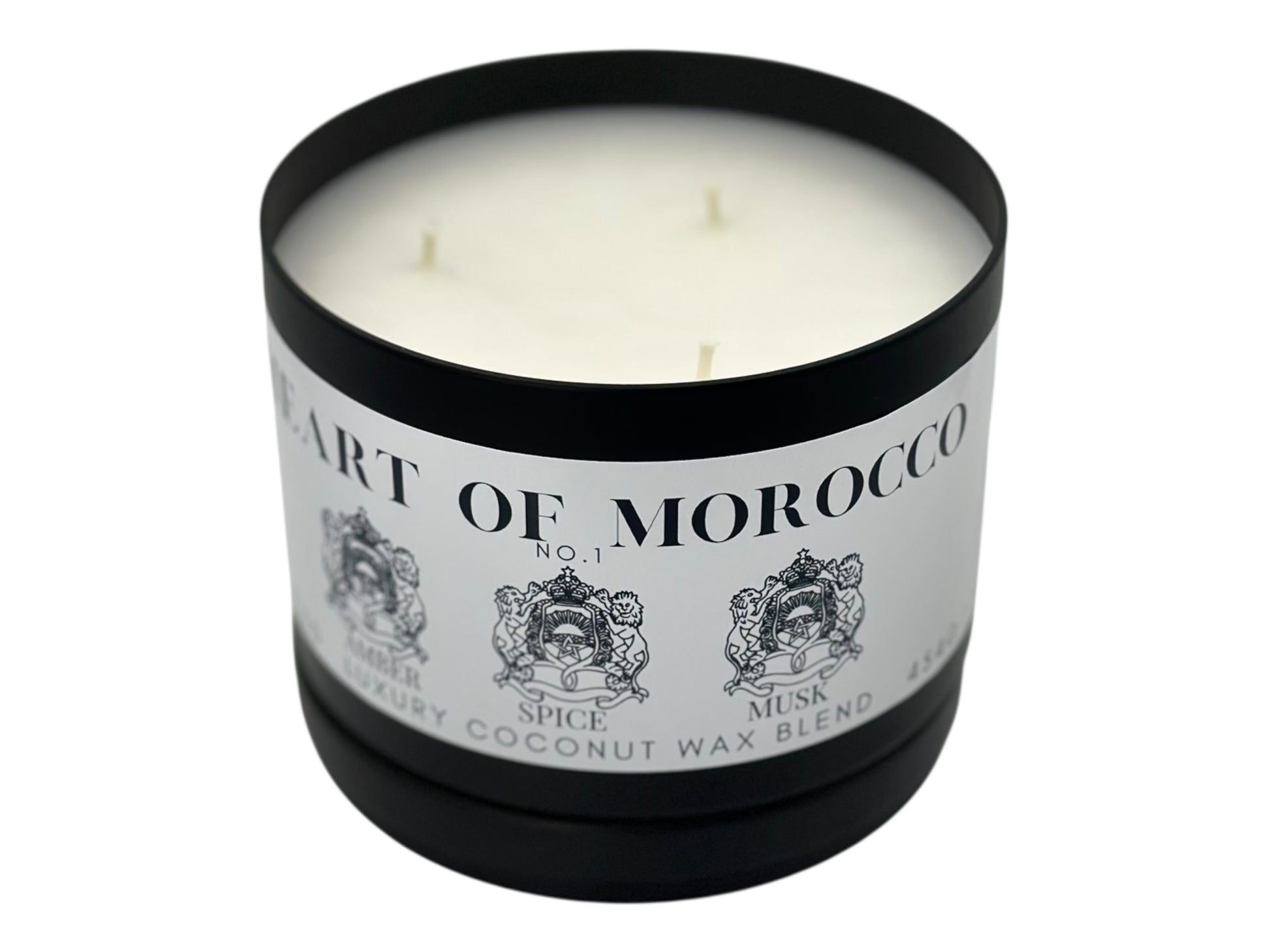 A black candle tin labeled "Heart of Morocco" lid removed on a white background.