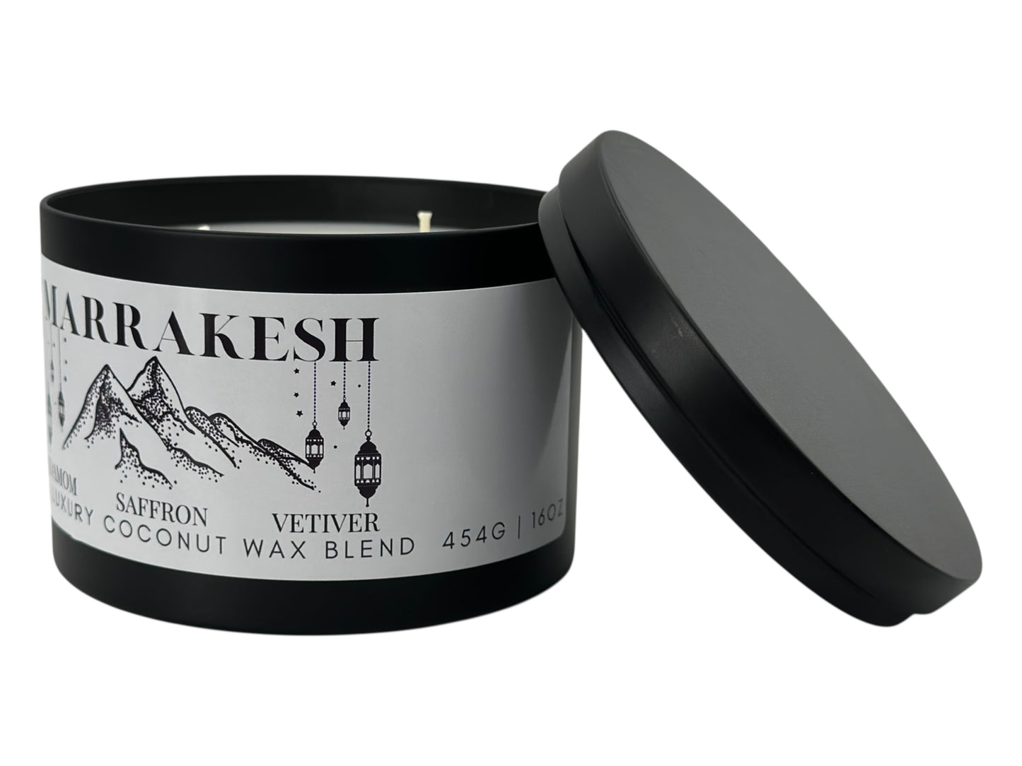 A black candle tin labeled "Marrakesh" lid removed on a white background.