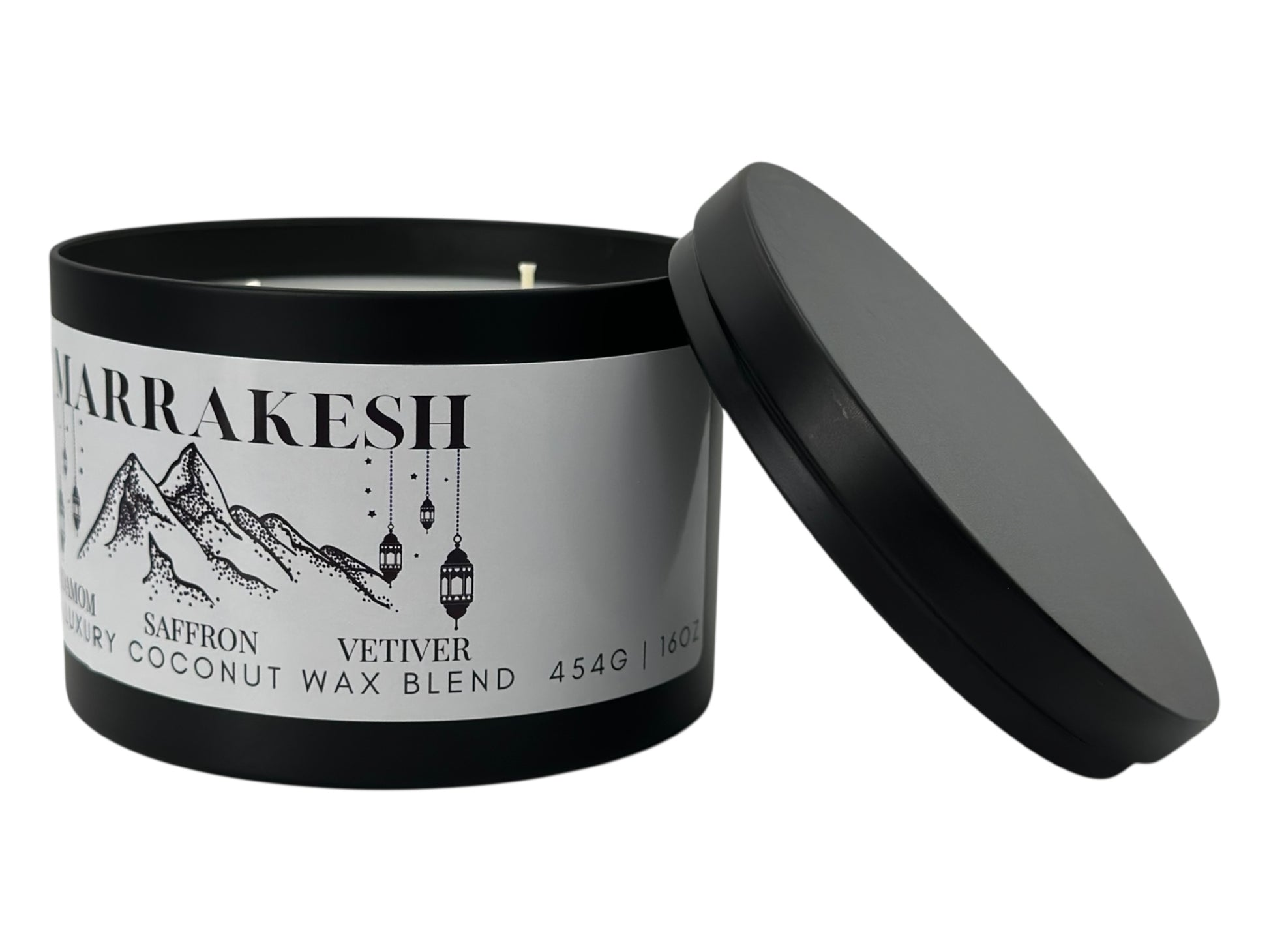 A black candle tin labeled "Marrakesh" lid removed on a white background.